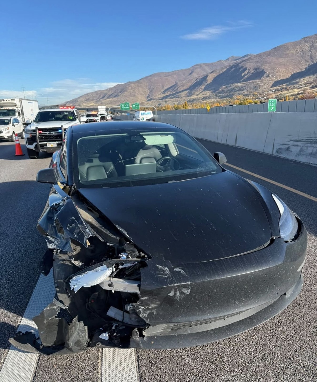 The founder's vehicle after being struck by a distracted driver on I-15 in Utah